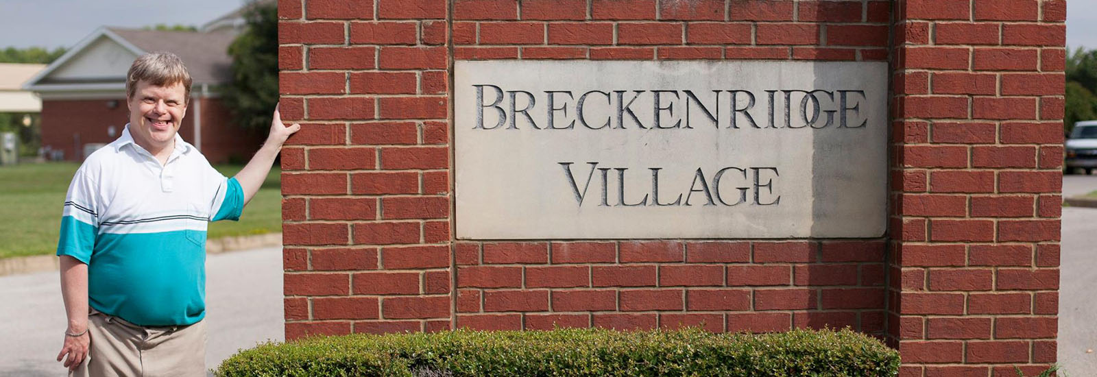 Photo: Jimmy Breckenridge poses with Breckenridge Village sign